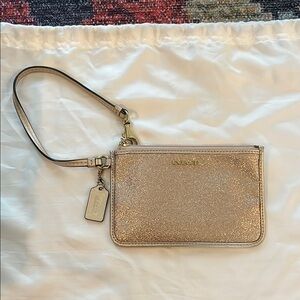 Coach wristlet, only used a few times! Large enough to fit credit cards, license